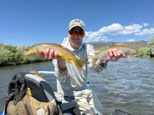 Hill's Discount Flies online shop - Fly Fishing Flies - Brandon on a float trip with fish