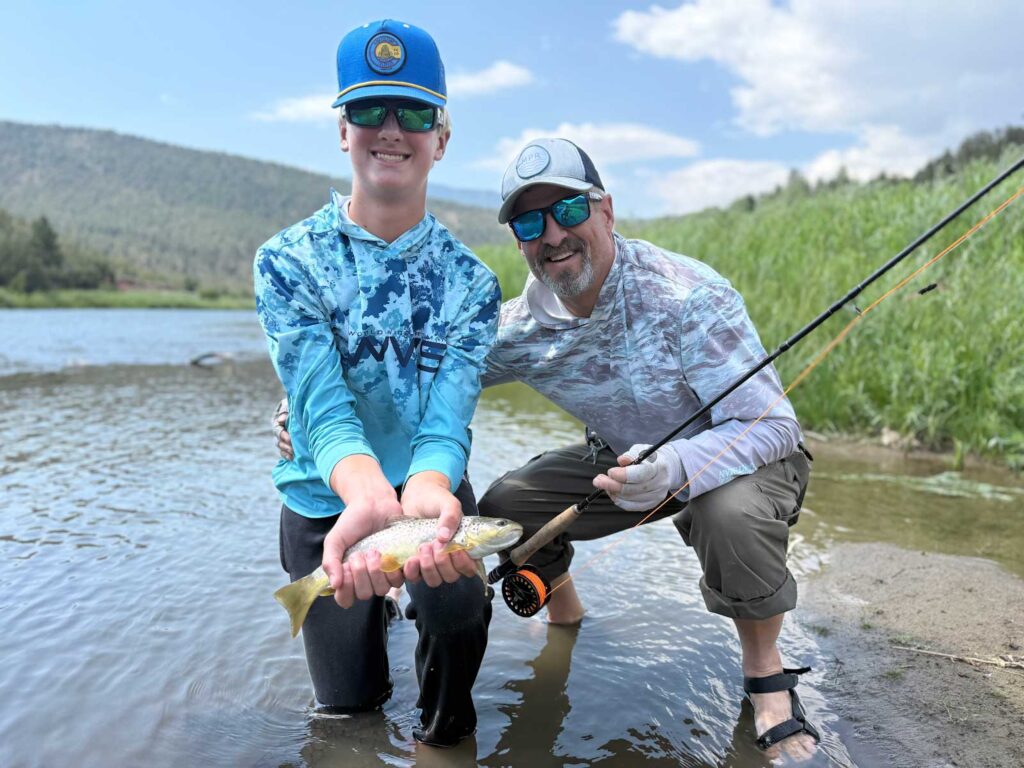 Father & son fishing Colorado River using fly fishing flies from Hill's Online Fly shop